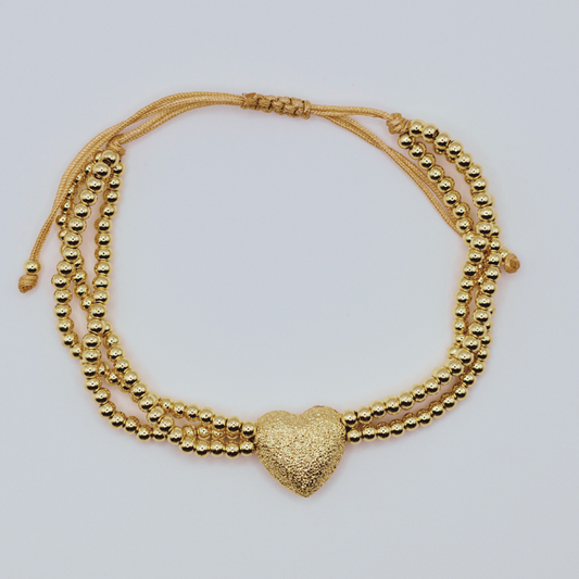 Pulsera balines corazón dorado