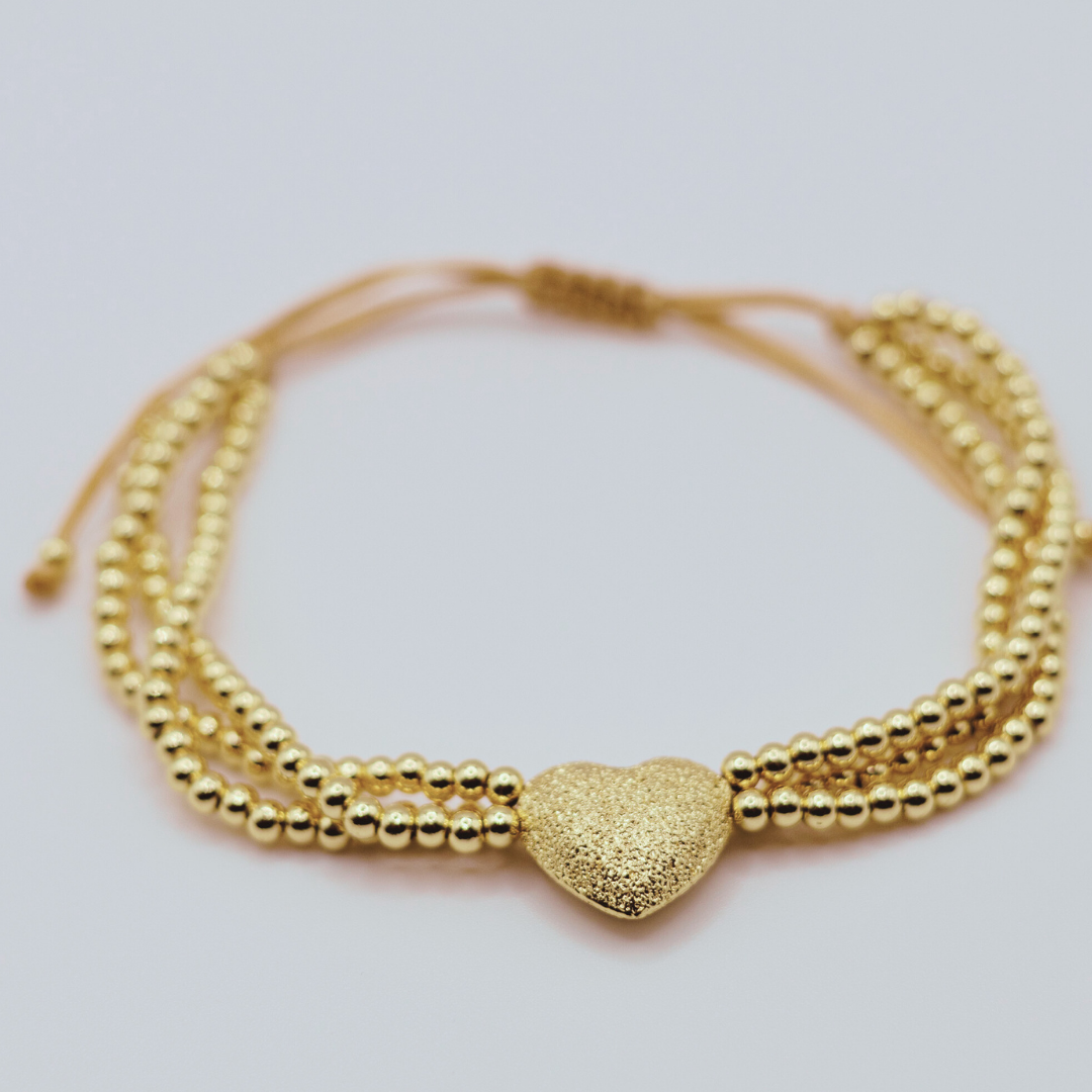 Pulsera balines corazón dorado